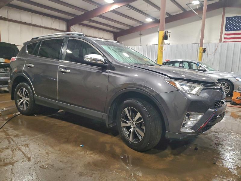 Photo 4 from auction – 2017 TOYOTA RAV4 XLE with VIN JTMRFREVXHJ712391