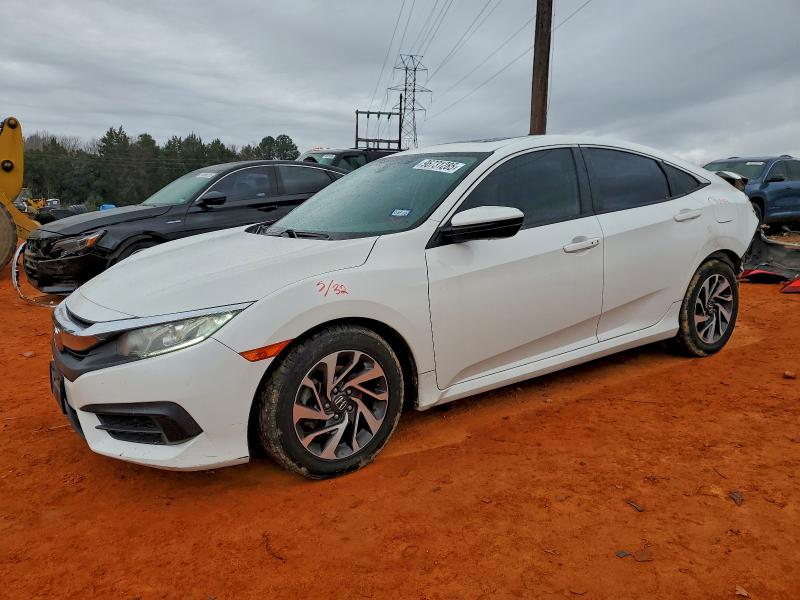 HONDA CIVIC EX 2017 con VIN 19XFC2F79HE046530 - Foto de la subasta