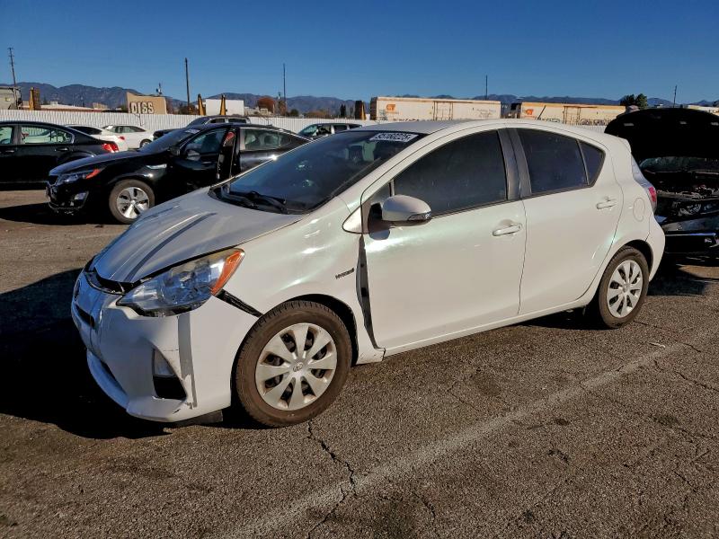 TOYOTA PRIUS C 2014 with VIN JTDKDTB31E1069285 - Photo from auction