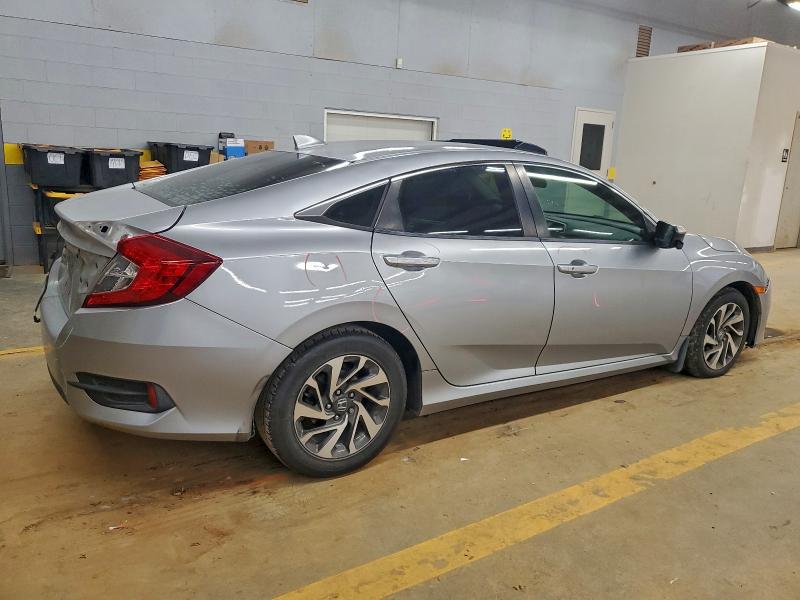Photo 3 from auction – 2018 HONDA CIVIC with VIN 19XFC2F76JE029660
