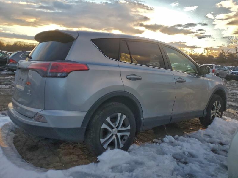 Photo 3 from auction – 2018 TOYOTA RAV4 LE with VIN JTMBFREV3JJ196365