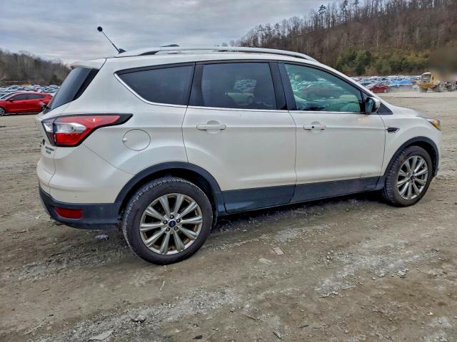 Photo 3 from auction – 2018 FORD ESCAPE TIT with VIN 1FMCU0J99JUB59751
