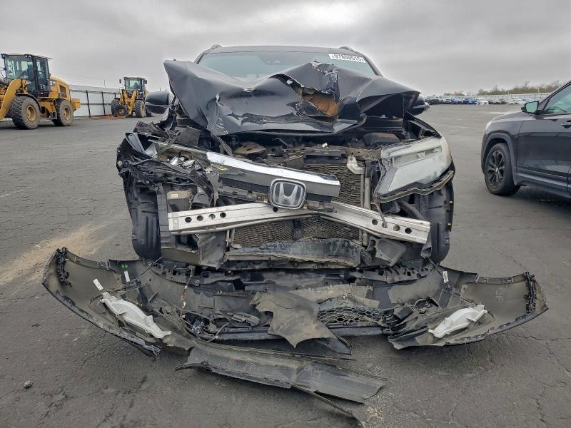 Photo 5 from auction – 2019 HONDA PILOT ELIT with VIN 5FNYF6H05KB053970
