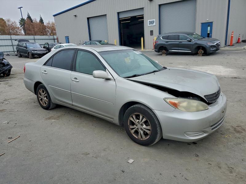 Photo 4 from auction – 2004 TOYOTA CAMRY LE with VIN 4T1BF30K54U064281