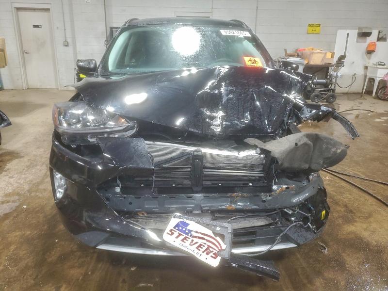 Photo 5 from auction – 2022 FORD ESCAPE SEL with VIN 1FMCU9H99NUA02463