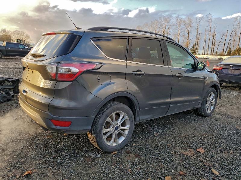 Photo 3 from auction – 2017 FORD ESCAPE SE with VIN 1FMCU9G96HUA00465