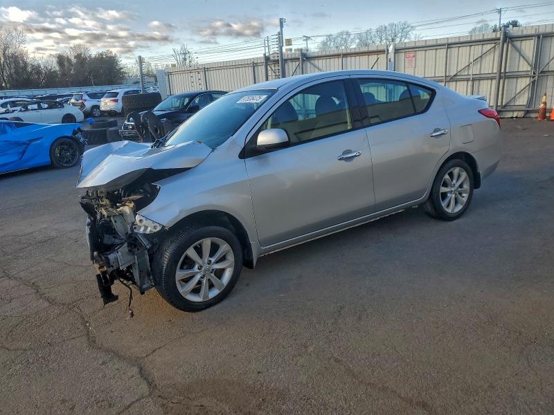 NISSAN VERSA S 2014 with VIN 3N1CN7AP4EL858619 - Photo from auction