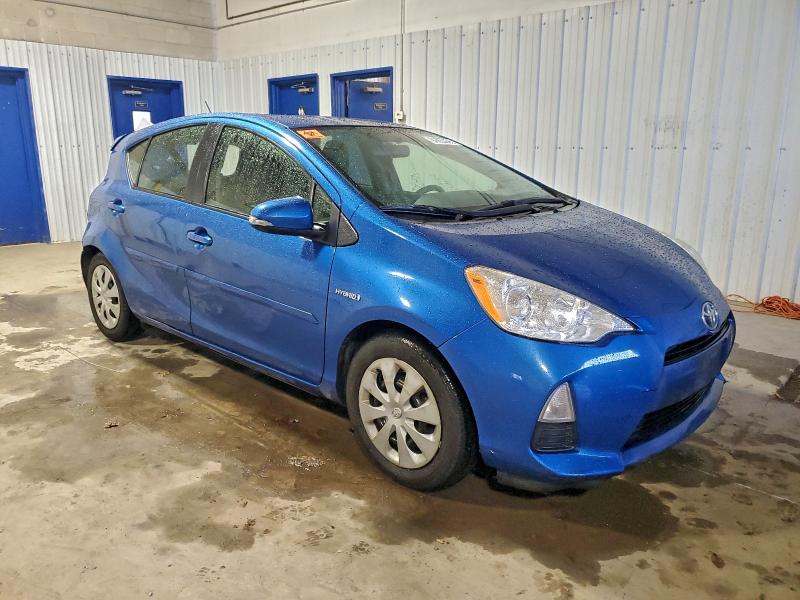 Photo 4 from auction – 2014 TOYOTA PRIUS C with VIN JTDKDTB38E1061085