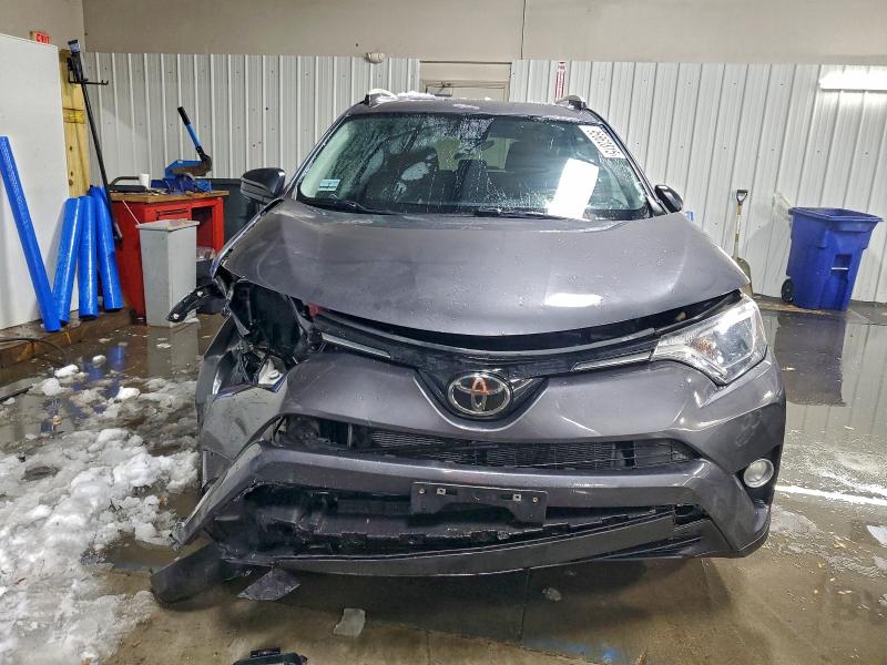 Photo 5 from auction – 2018 TOYOTA RAV4 LE with VIN 2T3BFREV7JW750962