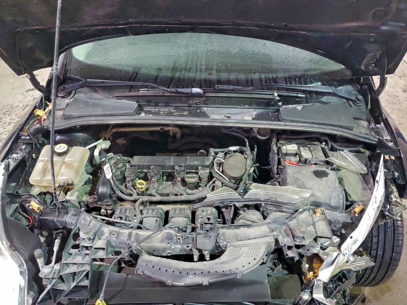 Photo 11 from auction – 2013 FORD FOCUS SE with VIN 1FADP3F21DL270615