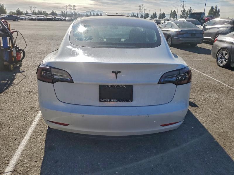 Photo 6 from auction – 2021 TESLA MODEL 3 with VIN 5YJ3E1EA0MF091011