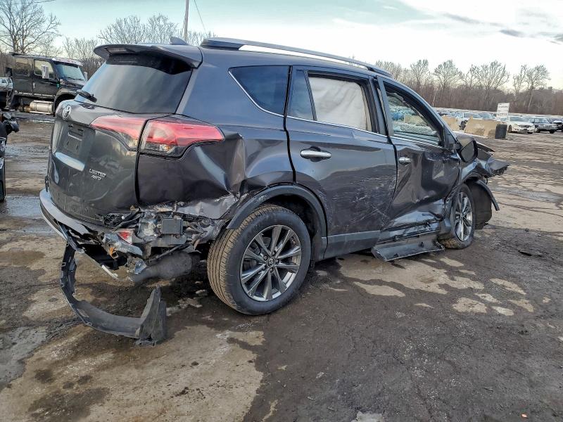 Photo 3 from auction – 2018 TOYOTA RAV4 with VIN JTMDFREV4JJ741188