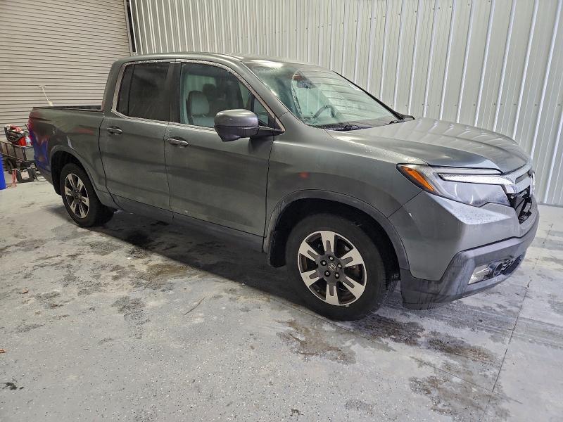Photo 4 from auction – 2017 HONDA RIDGELINE with VIN 5FPYK2F65HB011696