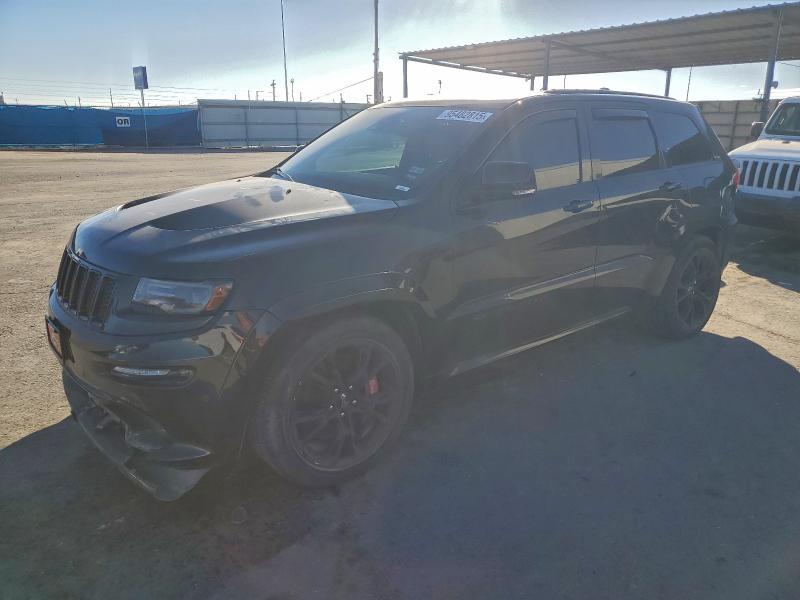 JEEP GRAND CHER 2014 with VIN 1C4RJFDJ9EC307294 - Photo from auction