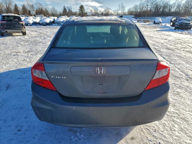 Photo 6 from auction – 2012 HONDA CIVIC LX with VIN 2HGFB2F57CH301403
