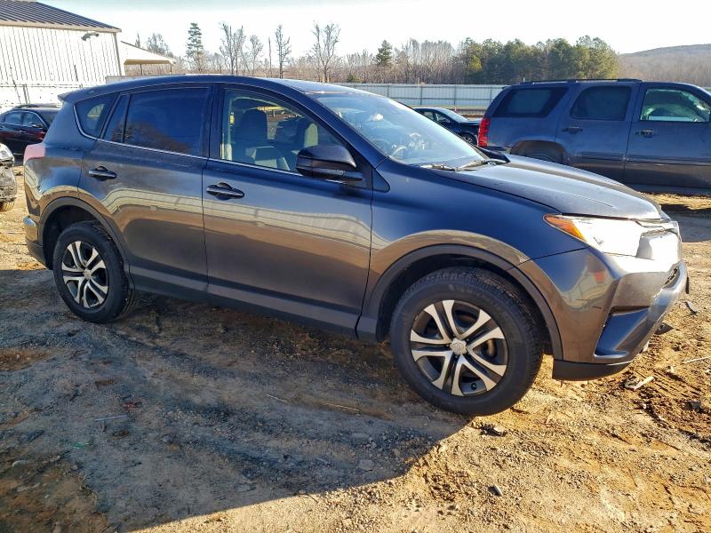 Photo 4 from auction – 2018 TOYOTA RAV4 LE with VIN JTMBFREV7JD223646