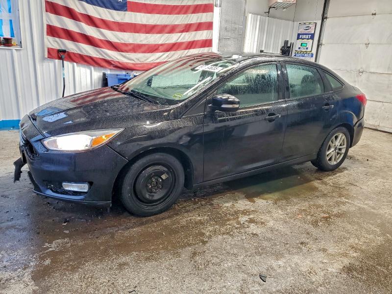 FORD FOCUS 2016 with VIN 1FADP3F28GL396619 - Photo from auction