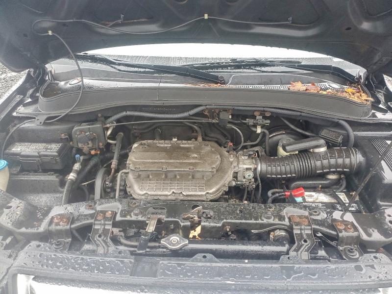 Photo 12 from auction – 2006 HONDA PILOT EX with VIN 2HKYF18786H540913