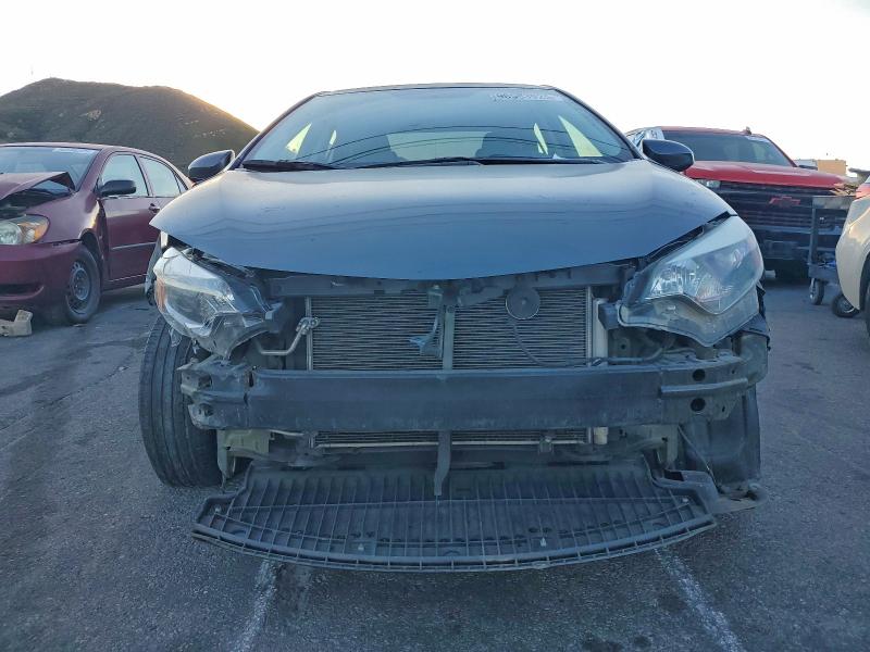 Photo 5 from auction – 2014 TOYOTA COROLLA L with VIN 5YFBURHE6EP101767