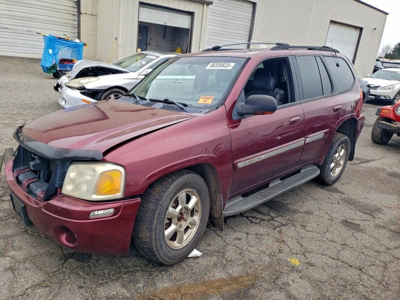 GMC ENVOY 2002 with VIN 1GKDT13S422369211 - Photo from auction