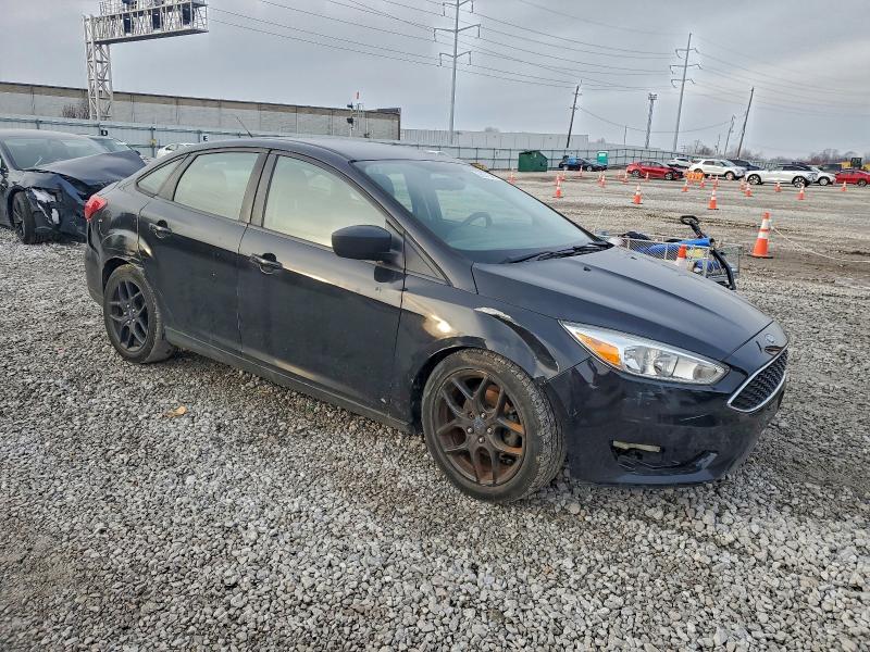 Photo 4 from auction – 2016 FORD FOCUS S with VIN 1FADP3E25GL243858