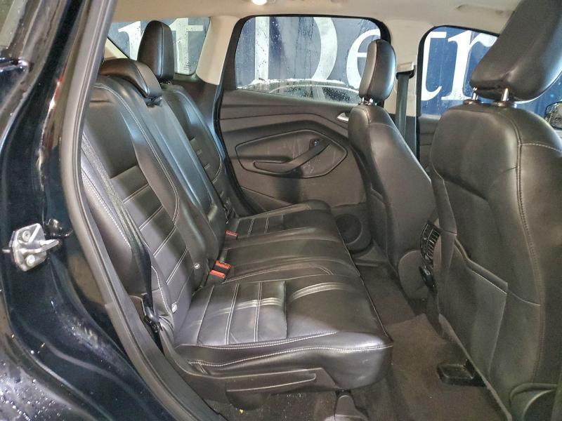 Photo 11 from auction – 2018 FORD ESCAPE TIT with VIN 1FMCU9J96JUA88576