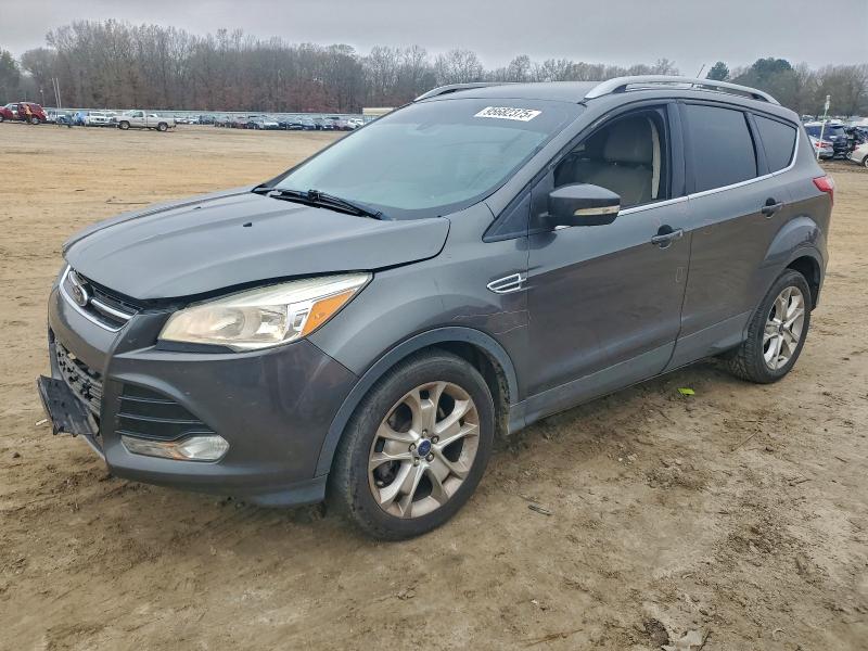 Photo 1 from auction – 2016 FORD ESCAPE TIT with VIN 1FMCU0J9XGUC20758