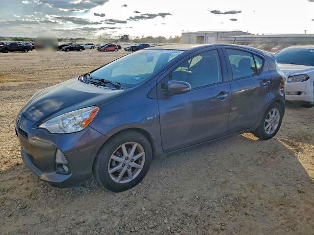 TOYOTA PRIUS C 2014 with VIN JTDKDTB3XE1567453 - Photo from auction