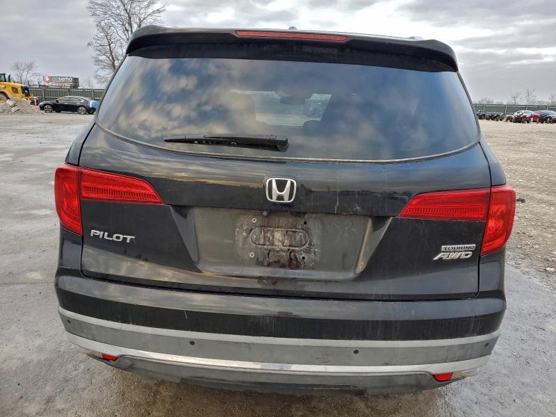 Photo 6 from auction – 2016 HONDA PILOT TOUR with VIN 5FNYF6H90GB028836