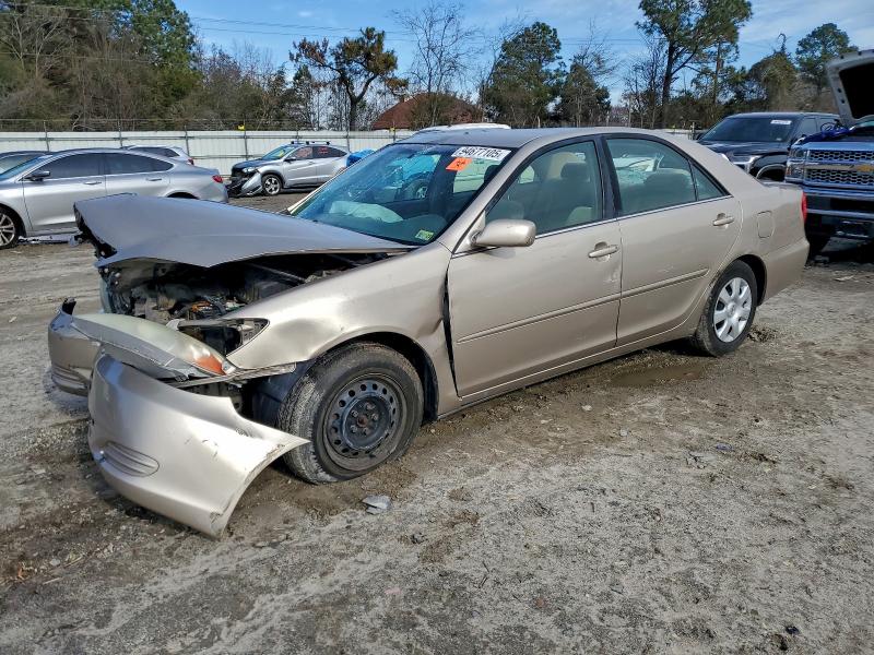 TOYOTA CAMRY LE 2003 with VIN 4T1BE32K73U701282 - Photo from auction