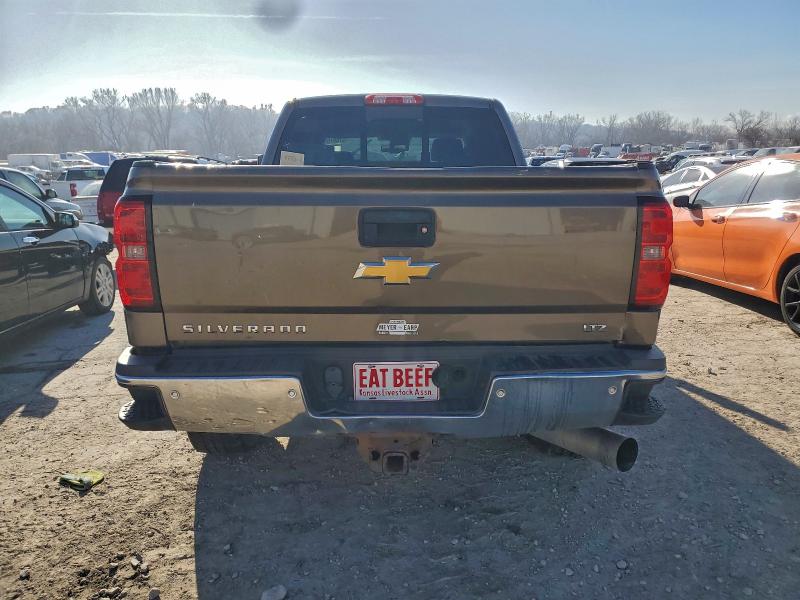 Photo 6 from auction – 2015 CHEVROLET SILVERADO with VIN 1GC1KWE82FF535157
