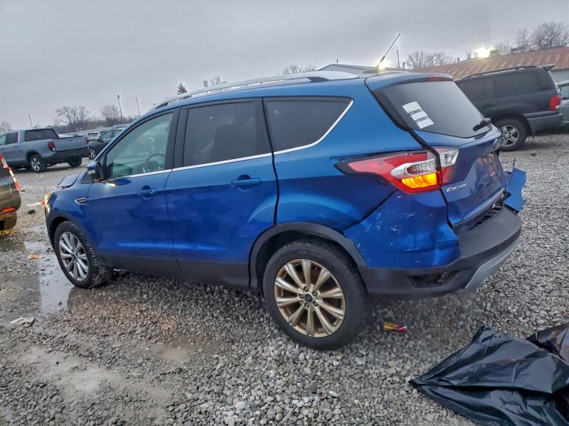 Photo 2 from auction – 2017 FORD ESCAPE TIT with VIN 1FMCU0JD6HUD08700