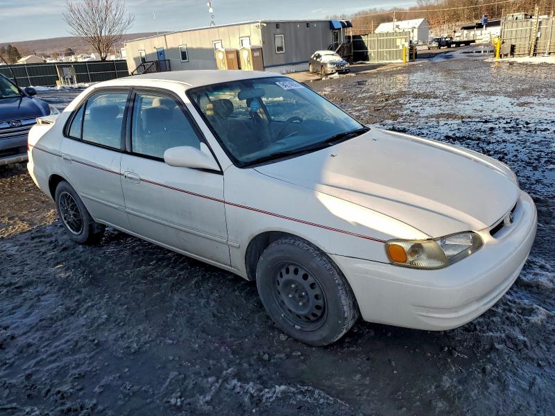 Photo 4 from auction – 1999 TOYOTA COROLLA VE with VIN 2T1BR12E3XC113714