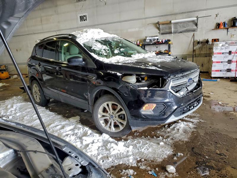 Photo 4 from auction – 2018 FORD ESCAPE with VIN 1FMCU9HD3JUC39089