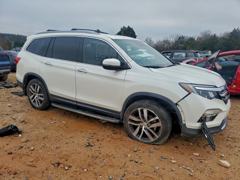 Photo 4 from auction – 2017 HONDA PILOT ELIT with VIN 5FNYF6H05HB100018