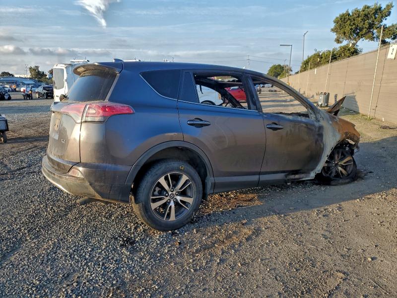 Photo 3 from auction – 2018 TOYOTA RAV4 with VIN JTMWFREV2JJ732238