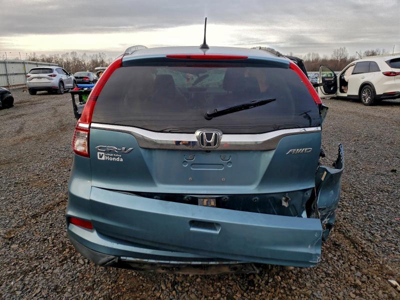 Photo 6 from auction – 2015 HONDA CR-V EXL with VIN 2HKRM4H76FH686500