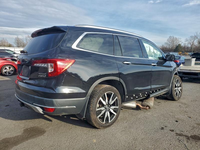 Photo 3 from auction – 2021 HONDA PILOT TOUR with VIN 5FNYF6H63MB033143