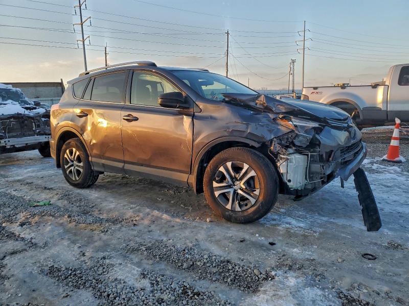 Photo 4 from auction – 2017 TOYOTA RAV4 LE with VIN JTMBFREV9HJ120000