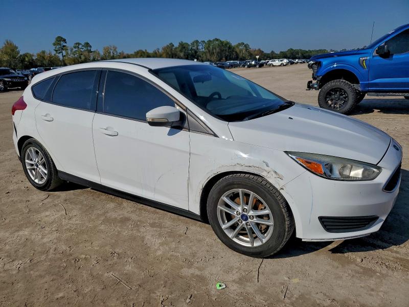 Photo 4 from auction – 2016 FORD FOCUS SE with VIN 1FADP3K28GL342825