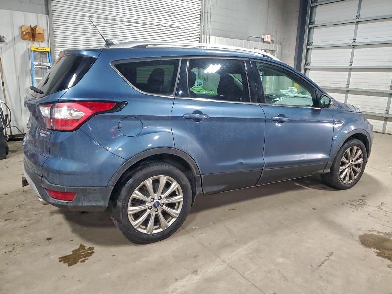 Photo 3 from auction – 2018 FORD ESCAPE TIT with VIN 1FMCU9J95JUC35552