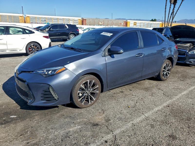 TOYOTA COROLLA L 2017 with VIN 5YFBURHE1HP689534 - Photo from auction