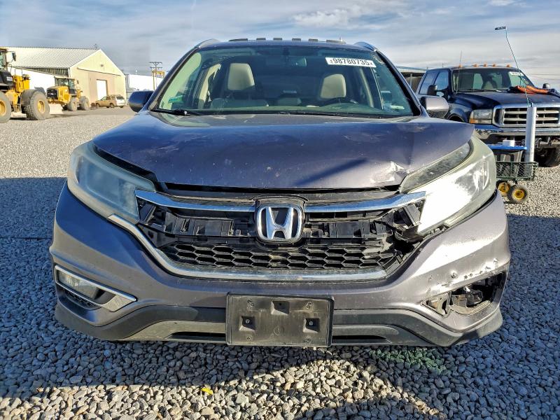 Photo 5 from auction – 2015 HONDA CR-V EXL with VIN 2HKRM4H76FH637569