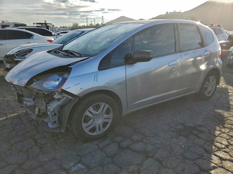 HONDA FIT 2011 with VIN JHMGE8H34BS004099 - Photo from auction