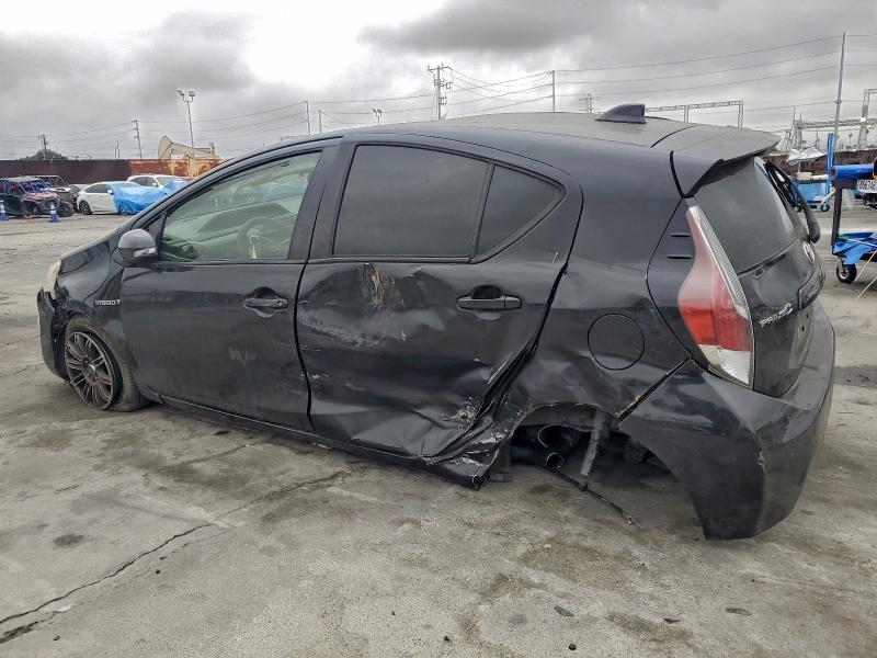 Photo 2 from auction – 2015 TOYOTA PRIUS C with VIN JTDKDTB37F1585345