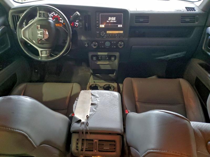Photo 8 from auction – 2011 HONDA RIDGELINE with VIN 5FPYK1F58BB003455