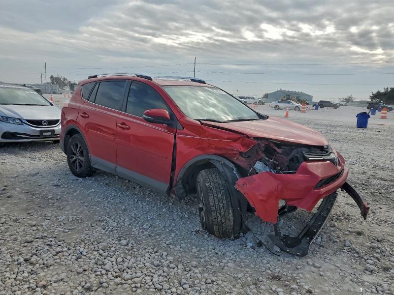 Photo 4 from auction – 2016 TOYOTA RAV4 XLE with VIN JTMWFREV6GJ082127