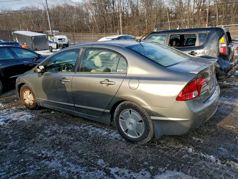 Photo 2 from auction – 2006 HONDA CIVIC HYBR with VIN JHMFA36206S004627