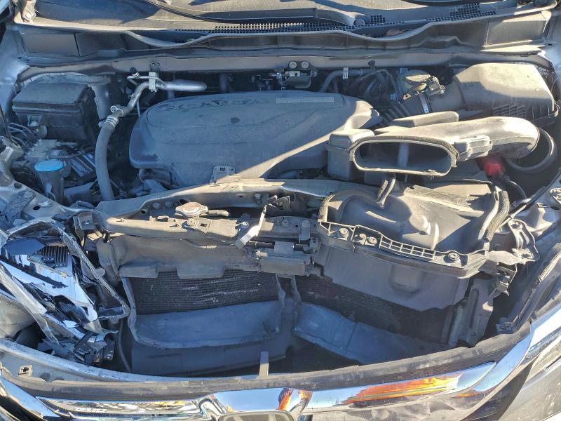 Photo 12 from auction – 2018 HONDA ODYSSEY with VIN 5FNRL6H90JB036410