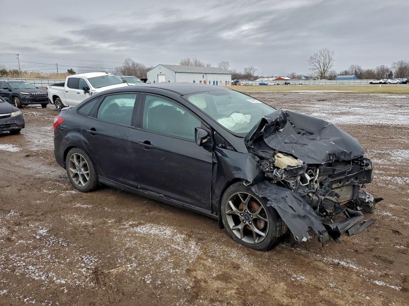 Photo 4 from auction – 2014 FORD FOCUS with VIN 1FADP3F26EL104849